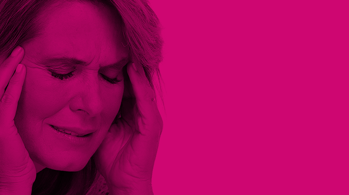 Kobieta z bólem głowy